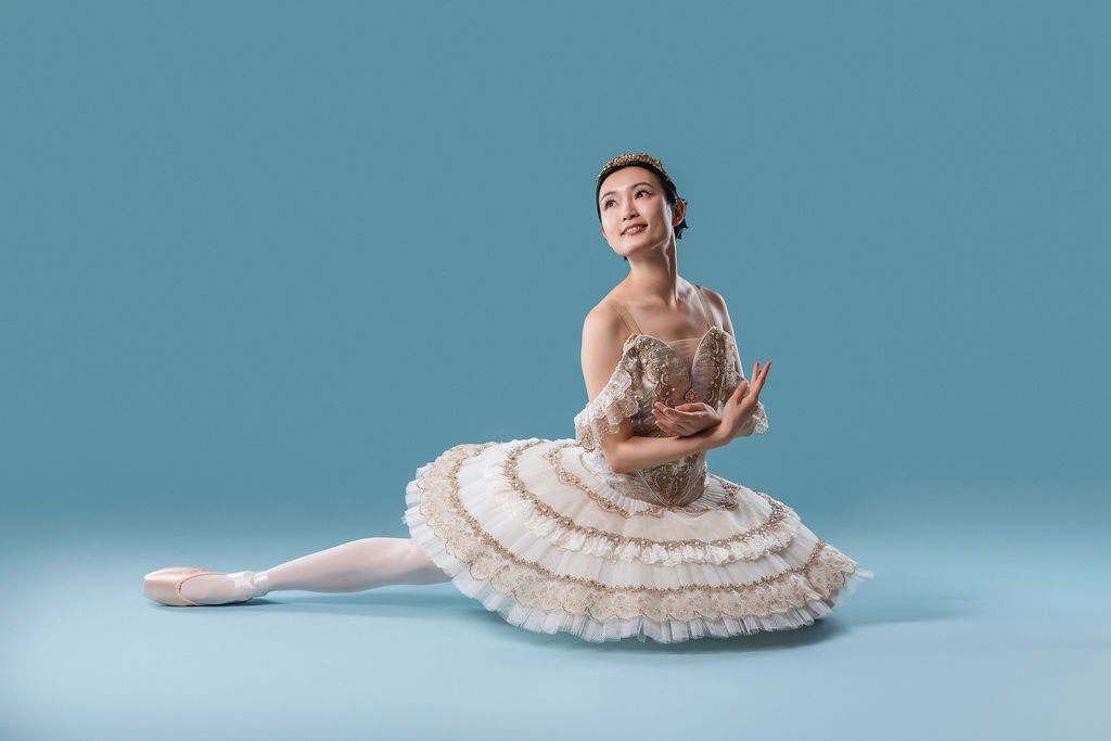 Dancer in flowing skirt, graceful pose