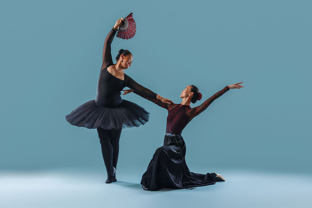 Dancer in red flowing skirt on pointe