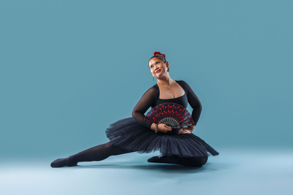 Dancer in sweeping red skirt