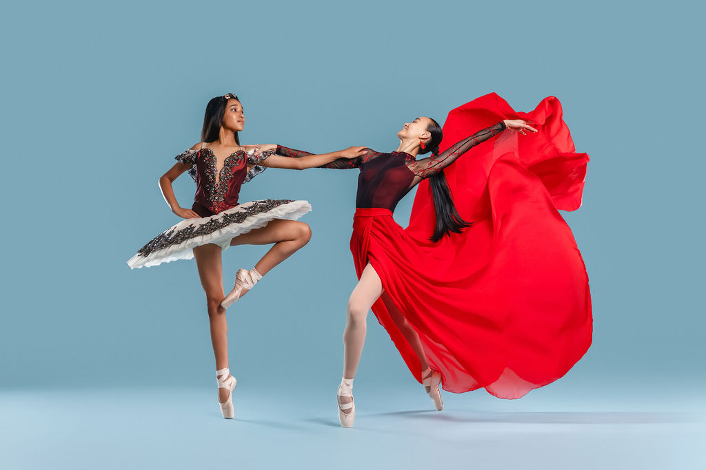 Teacher and junior dancer together